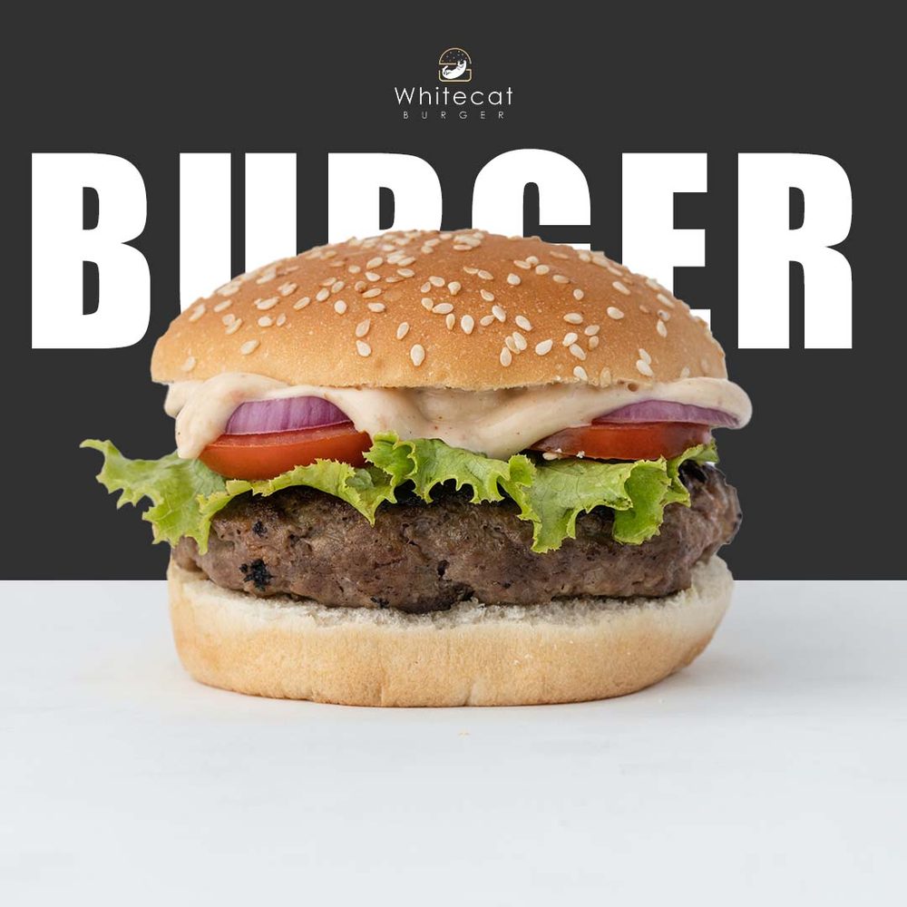 Classic burger with lettuce, tomato and onion