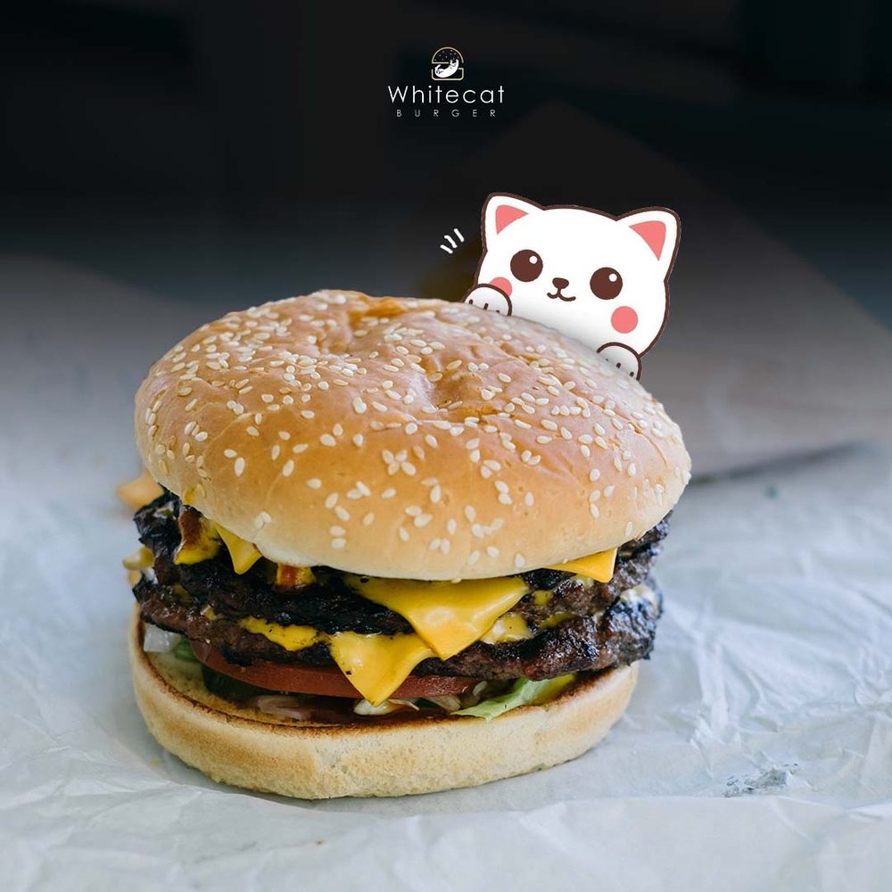 Double-stacked cheeseburger with pickles